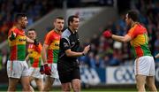 3 June 2017; Carlow players Daniel St. Ledger, left, Gary Kelly, and Darragh Foley despute a decision by referee Sean Hurson during the Leinster GAA Football Senior Championship Quarter-Final match between Dublin and Carlow at O'Moore Park, Portlaoise, in Co. Laois.  Photo by Ray McManus/Sportsfile