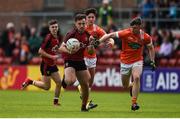 4 June 2017; Conor Clarke of Down in action against James Haughey of Armagh during the Ulster GAA Football Minor Championship Quarter-Final match between Down and Armagh at Páirc Esler, in Newry. Photo by Philip Fitzpatrick/Sportsfile