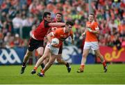 4 June 2017; Joey McElroy of Armagh in action against Niall Donnelly of Down during the Ulster GAA Football Senior Championship Quarter-Final match between Down and Armagh at Páirc Esler, in Newry. Photo by Daire Brennan/Sportsfile