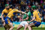4 June 2017; Barry Murphy of Limerick in action against Michael O'Malley, left, Eóin Quirke, and Ben O'Gorman of Clare during the Munster GAA Hurling U25 Championship Semi-Final match between Limerick and Clare at Semple Stadium, in Thurles, Co. Tipperary. Photo by Diarmuid Greene/Sportsfile