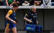 4 June 2017; David Fitzgerald of Clare leaves the field, with Clare team doctor Dr Padraig Quinn, to receive attention after sustaining a small cut in the warm up before the Munster GAA Hurling Senior Championship Semi-Final match between Limerick and Clare at Semple Stadium, in Thurles, Co. Tipperary. Photo by Ray McManus/Sportsfile
