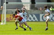 4 June 2017; Laois goalkeeper Graham Brody is tackled by Cathal McNally of Kildare as he makes his way up the field during the Leinster GAA Football Senior Championship Quarter-Final match between Laois and Kildare at O'Connor Park, in Tullamore, Co. Offaly.   Photo by Piaras Ó Mídheach/Sportsfile