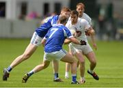 4 June 2017; Johnny Byrne of Kildare in action against Evan O’Carroll and Damien O’Connor of Laois, 7, during the Leinster GAA Football Senior Championship Quarter-Final match between Laois and Kildare at O'Connor Park, in Tullamore, Co. Offaly.   Photo by Piaras Ó Mídheach/Sportsfile
