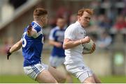 4 June 2017; Paul Cribbin of Kildare in action against Evan O’Carroll of Laois during the Leinster GAA Football Senior Championship Quarter-Final match between Laois and Kildare at O'Connor Park, in Tullamore, Co. Offaly.   Photo by Piaras Ó Mídheach/Sportsfile