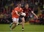 4 June 2017; Mark Shields of Armagh in action against Caolan Mooney of Down during the Ulster GAA Football Senior Championship Quarter-Final match between Down and Armagh at Páirc Esler, in Newry. Photo by Philip Fitzpatrick/Sportsfile