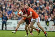 4 June 2017; Caolan Mooney of Down in action against Brendan Donaghy of Armagh during the Ulster GAA Football Senior Championship Quarter-Final match between Down and Armagh at Páirc Esler, in Newry. Photo by Daire Brennan/Sportsfile