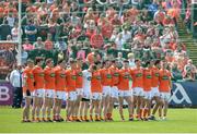 4 June 2017; The Armagh team stand together during a minute's silence in memory of Cavan mentor Dominic Earley who died in a road accident, ahead of the Ulster GAA Football Senior Championship Quarter-Final match between Down and Armagh at Páirc Esler, in Newry. Photo by Daire Brennan/Sportsfile