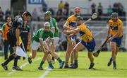 4 June 2017; Linesman Brian Gavin keeps a close eye on the sliothar as Limerick's Cian Lynch and Clare's John Conlon vie for possession during the Munster GAA Hurling Senior Championship Semi-Final match between Limerick and Clare at Semple Stadium, in Thurles, Co. Tipperary. Photo by Ray McManus/Sportsfile