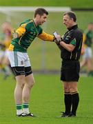 8 January 2012; Mark Ward, Meath, is spoken to by referee Paul Kneel. Bord Na Mona O'Byrne Cup, First Round, Meath v Wexford, Pairc Tailteann, Navan, Co. Meath. Picture credit: Brendan Moran / SPORTSFILE