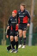 10 January 2012; Munster's Jerry Flannery and BJ Botha, left, warm up during squad training ahead of their Heineken Cup, Pool 1, Round 5, game against Castres Olympique on Saturday. Munster Rugby Squad Training, Cork Institute of Technology, Bishopstown, Cork. Picture credit: Diarmuid Greene / SPORTSFILE