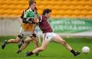 8 January 2012; Callum McCormack, Westmeath, in action against Sean Pender, Offaly. Bord Na Mona O'Byrne Cup, First Round, Offaly v Westmeath, O'Connor Park, Tullamore, Co. Offaly. Picture credit: Pat Murphy / SPORTSFILE