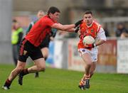 8 January 2012; Eugene McVerry, Armagh, in action against Peter Turley, Down. Dr. McKenna Cup, Section B, Down v Armagh, Pairc Esler, Newry, Co. Down. Picture credit: Oliver McVeigh / SPORTSFILE