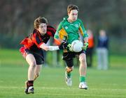 13 January 2012; Eoin Murphy, St. Benildus College, in action against Niall Kelly, Ardscoil na Trionoide, Athy. Leinster Colleges Senior Football 'A' Championship, Round 1, UCD Astroturf, Belfield, Dublin. Picture credit: Matt Browne / SPORTSFILE