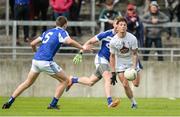 4 June 2017; David Slattery of Kildare in action against Eóin Buggie left, and Denis Booth of Laois during the Leinster GAA Football Senior Championship Quarter-Final match between Laois and Kildare at O'Connor Park, in Tullamore, Co. Offaly. Photo by Piaras Ó Mídheach/Sportsfile