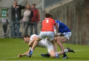 4 June 2017; Fionn Dowling of Kildare in action against Graham Brody and Colm Begley of Laois, right, during the Leinster GAA Football Senior Championship Quarter-Final match between Laois and Kildare at O'Connor Park, in Tullamore, Co. Offaly. Photo by Piaras Ó Mídheach/Sportsfile