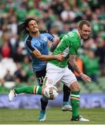 4 May 2017; Glenn Whelan of Republic of Ireland in action against Edinson Cavani of Uruguay during the international friendly match between Republic of Ireland and Uruguay at the Aviva Stadium in Dublin. Photo by Ramsey Cardy/Sportsfile
