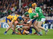 4 June 2017; Conor McGrath of Clare supported by Shane O'Donnell, left, and John Conlon in action against Sean Finn and Richie English of Limerick, right, during the Munster GAA Hurling Senior Championship Semi-Final match between Limerick and Clare at Semple Stadium, in Thurles, Co. Tipperary. Photo by Ray McManus/Sportsfile