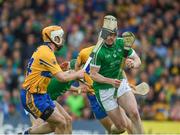 4 June 2017; Declan Hannon of Limerick in action against Conor McGrath of Clare during the Munster GAA Hurling Senior Championship Semi-Final match between Limerick and Clare at Semple Stadium, in Thurles, Co. Tipperary. Photo by Ray McManus/Sportsfile