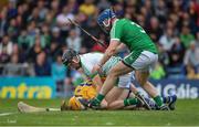 4 June 2017; Limerick concede a penalty as Aaron Cunningham of Clare is held down by Limerick goalkeeper Nickie Quaid and full back Richie McCarthy late in the Munster GAA Hurling Senior Championship Semi-Final match between Limerick and Clare at Semple Stadium, in Thurles, Co. Tipperary. Photo by Ray McManus/Sportsfile