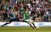 4 May 2017; James McClean of Republic of Ireland shoots to score his sides third goal, depite the attentions of Sebastian Coates of Uruguay during the international friendly match between Republic of Ireland and Uruguay at the Aviva Stadium in Dublin. Photo by David Maher/Sportsfile