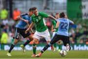 4 May 2017; Daryl Murphy of Republic of Ireland in action against Martin Caceres (R), and Matias Vecino of Uruguay during the international friendly match between Republic of Ireland and Uruguay at the Aviva Stadium in Dublin. Photo by Eóin Noonan/Sportsfile