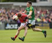 4 June 2017; Anthony Williams of Louth in action against Donnacha Tobin of Meath during the Leinster GAA Football Senior Championship Quarter-Final match between Meath and Louth at Parnell Park, in Dublin. Photo by Matt Browne/Sportsfile