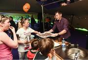 5 June 2017; VHI support team member David Gillick hands out food in the Vhi relaxation area after the Vhi Women’s Mini Marathon 2017. Nearly 33,000 participants took to the streets of Dublin to run, walk and jog the 10km route, raising much needed funds for hundreds of charities around the country. For further information please log on to www.vhiwomensminimarathon.ie Photo by Seb Daly/Sportsfile