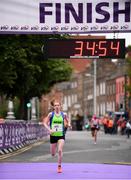 5 June 2017; Catherina Mullen from Dunboyne, Co Meath, crosses the finish line to finish third in the Vhi Women’s Mini Marathon 2017. Nearly 33,000 participants took to the streets of Dublin to run, walk and jog the 10km route, raising much needed funds for hundreds of charities around the country. For further information please log on to www.vhiwomensminimarathon.ie  Photo by Sam Barnes/Sportsfile