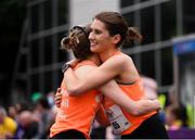 5 June 2017; Runners celebrate after finishing the Vhi Women’s Mini Marathon 2017. Nearly 33,000 participants took to the streets of Dublin to run, walk and jog the 10km route, raising much needed funds for hundreds of charities around the country. For further information please log on to www.vhiwomensminimarathon.ie  Photo by Sam Barnes/Sportsfile
