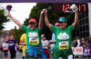 5 June 2017; Runners celebrate crossing the finish line during the Vhi Women’s Mini Marathon 2017. Nearly 33,000 participants took to the streets of Dublin to run, walk and jog the 10km route, raising much needed funds for hundreds of charities around the country. For further information please log on to www.vhiwomensminimarathon.ie  Photo by Sam Barnes/Sportsfile