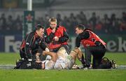 13 January 2012; Stephen Ferris, Ulster, having an injury attended to by Dr. Michael Webb, left, Ulster Chief Medical officer, Gareth Robinson, Ulster head physiotherapist and Alan McCaldin, right, Ulster physiotherapist. Heineken Cup, Pool 4, Round 5, Ulster v Leicester Tigers, Ravenhill Park, Belfast, Co. Antrim. Picture credit: Oliver McVeigh / SPORTSFILE