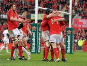 14 January 2012; Johne Murphy, Munster, celebrates with team-mates Damien Varley, Niall Ronan, Conor Murray and Donnacha Ryan, after scoring his side's first try. Heineken Cup, Pool 1, Round 5, Munster v Castres Olympique, Thomond Park, Limerick. Picture credit: Diarmuid Greene / SPORTSFILE