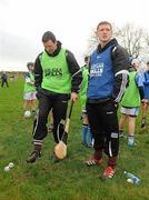 14 January 2012; Brendan Cumins, Tipperary, with Dublin's Paul Flynn, right, during the inaugural AIB GAA Skills Challenge Day in Na Piarsaigh GAA club. AIB, proud sponsors of the GAA Club Championships joined up with the Limerick Senior Hurling Champions to celebrate the club’s county and provincial successes and acknowledge the role which the club plays in the community by supporting them in hosting the first ever AIB GAA Skills Challenge Day. Na Piarsaigh GAA, Limerick. Picture credit: Pat Murphy / SPORTSFILE