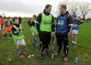 14 January 2012; Brendan Cumins, Tipperary, in conversation with Dublin's Paul Flynn, right, while Na Piarsaigh's Paul O'Hagan, left, looks on during the inaugural AIB GAA Skills Challenge Day in Na Piarsaigh GAA club. AIB, proud sponsors of the GAA Club Championships joined up with the Limerick Senior Hurling Champions to celebrate the club’s county and provincial successes and acknowledge the role which the club plays in the community by supporting them in hosting the first ever AIB GAA Skills Challenge Day. Na Piarsaigh GAA, Limerick. Picture credit: Pat Murphy / SPORTSFILE