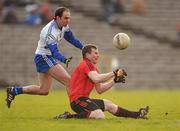 15 January 2012; Daniel McCartan, Down, in action against Paul Finlay, Monaghan. Power NI Dr. McKenna Cup, Section B, Monaghan v Down, St Tiernach's Park, Clones, Co. Monaghan. Photo by Sportsfile