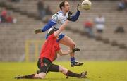 15 January 2012; Paul Finlay, Monaghan, in action against Daniel McCartan, Down. Power NI Dr. McKenna Cup, Section B, Monaghan v Down, St Tiernach's Park, Clones, Co. Monaghan. Photo by Sportsfile