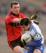 15 January 2012; Ciaran Hanratty, Monaghan, in action against Damian Turley, Down. Power NI Dr. McKenna Cup, Section B, Monaghan v Down, St Tiernach's Park, Clones, Co. Monaghan. Photo by Sportsfile