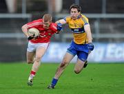 15 January 2012; Aidan O'Reilly, Cork, in action against Gary Brennan, Clare. McGrath Cup Football, Quarter-Final, Cork v Clare, Pairc Ui Rinn, Cork. Picture credit: Matt Browne / SPORTSFILE