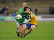 15 January 2012; Gerry Hickey, Leitrim, in action against Cathal Dineen, Roscommon. FBD Insurance League, Section B, Round 2, Leitrim v Roscommon, Páirc Seán O'Heslin, Ballinamore, Co. Leitrim. Picture credit: Barry Cregg / SPORTSFILE