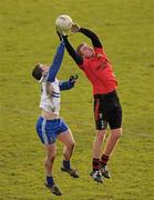 15 January 2012; Arthur McConville, Down, in action against Dermot Malone, Monaghan. Power NI Dr. McKenna Cup, Section B, Monaghan v Down, St Tiernach's Park, Clones, Co. Monaghan. Photo by Sportsfile