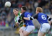 15 January 2012; Anthony Thompson, Donegal, in action against David Givney and Padraic O'Reilly, right, Cavan. Power NI Dr. McKenna Cup - Section C, Cavan v Donegal, Kingspan Breffni Park, Cavan. Picture credit: Brian Lawless / SPORTSFILE
