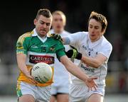 15 January 2012; Ken Casey, Offaly, in action against Ollie Lyons, Kildare. Bord na Mona O'Byrne Cup, Quarter-Final, Kildare v Offaly, St Conleth's Park, Newbridge, Co. Kildare. Picture credit: Dáire Brennan / SPORTSFILE
