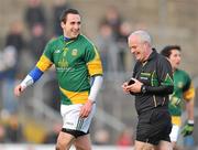 15 January 2012; Graham Reilly, Meath, with referee Sean Carroll, after scoring a point. Bord na Mona O'Byrne Cup, Quarter-Final, Meath v Louth, Pairc Tailteann, Navan, Co. Meath. Picture credit: David Maher / SPORTSFILE