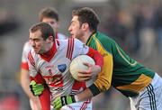 15 January 2012; Paddy Keenan, Louth, in action against Mark Ward, Meath. Bord na Mona O'Byrne Cup, Quarter-Final, Meath v Louth, Pairc Tailteann, Navan, Co. Meath. Picture credit: David Maher / SPORTSFILE