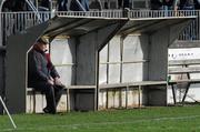 15 January 2012; Kildare supporter Joe Moore, from Coill Dubh, watches the game from the dugout. Bord na Mona O'Byrne Cup, Quarter-Final, Kildare v Offaly, St Conleth's Park, Newbridge, Co. Kildare. Picture credit: Dáire Brennan / SPORTSFILE