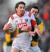 15 January 2012; Brian Donnelly, Louth, in action against Brian Meade, Meath. Bord na Mona O'Byrne Cup, Quarter-Final, Meath v Louth, Pairc Tailteann, Navan, Co. Meath. Picture credit: David Maher / SPORTSFILE