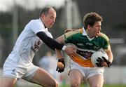 15 January 2012; Brian Darby, Offaly, in action against James Kavanagh, Kildare. Bord na Mona O'Byrne Cup, Quarter-Final, Kildare v Offaly, St Conleth's Park, Newbridge, Co. Kildare. Picture credit: Dáire Brennan / SPORTSFILE