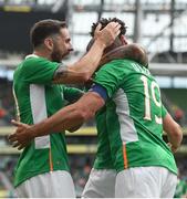 4 May 2017; Jonathan Walters of Republic of Ireland celebrates with teammates Robbie Brady, left, and Cyrus Christie, centre, after scoring his side's first goal during the international friendly match between Republic of Ireland and Uruguay at the Aviva Stadium in Dublin. Photo by Ramsey Cardy/Sportsfile
