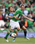 4 May 2017; Edinson Cavani of Uruguay in action against Glenn Whelan of Republic of Ireland during the international friendly match between Republic of Ireland and Uruguay at the Aviva Stadium in Dublin. Photo by Ramsey Cardy/Sportsfile