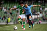 4 May 2017; Cyrus Christie of Republic of Ireland is tackled by Diego Laxalt of Uruguay during the international friendly match between Republic of Ireland and Uruguay at the Aviva Stadium in Dublin. Photo by Ramsey Cardy/Sportsfile